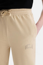 UCLA Pantaloni de trening cu elastic si snur in talie, manseta elastica si logo discret, Bej, JEZEBEL