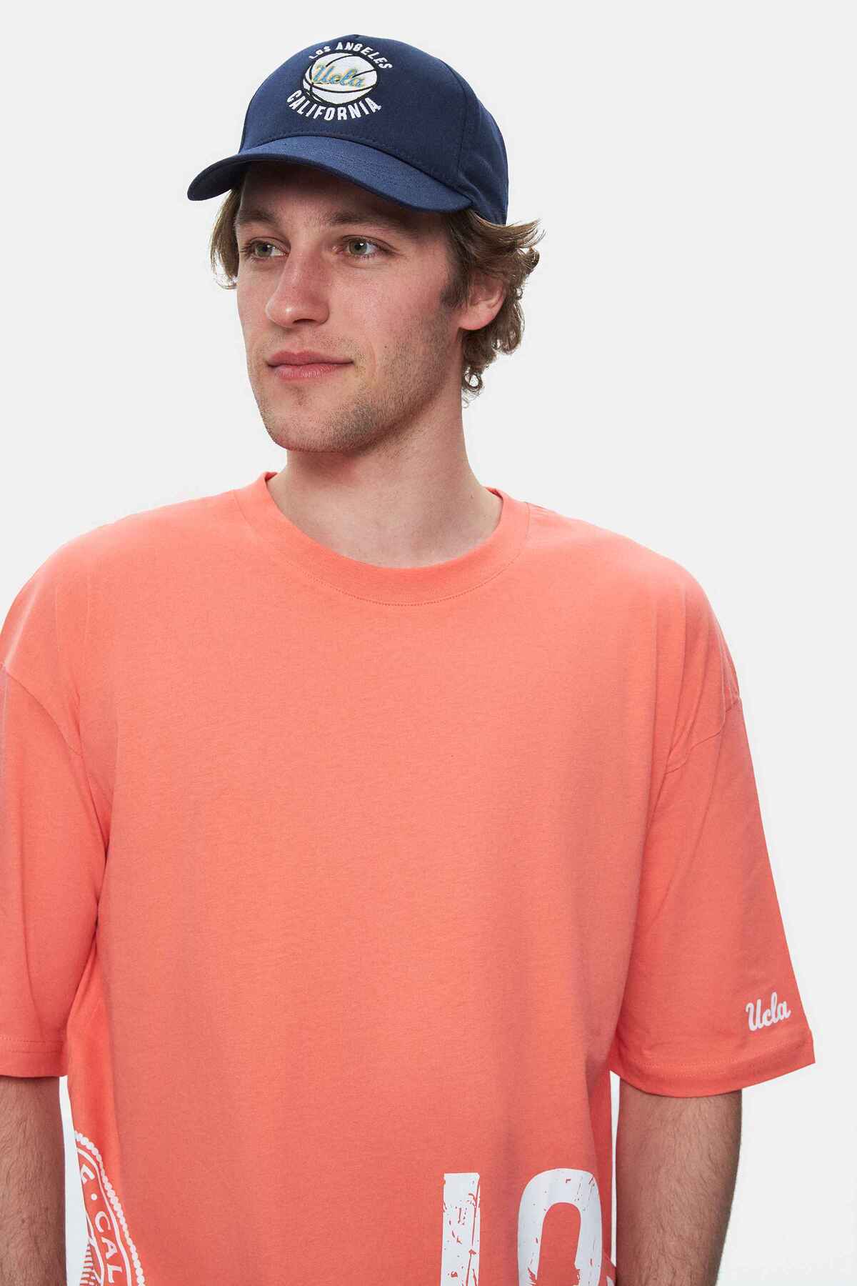 UCLA Tricou cu decolteu la baza gatului, imprimeu cu logo, regular fit, Roz deschis, IGNISO