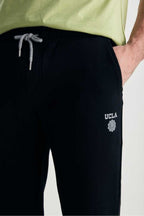 UCLA Pantaloni de trening cu elastic si snur in talie, buzunare laterale